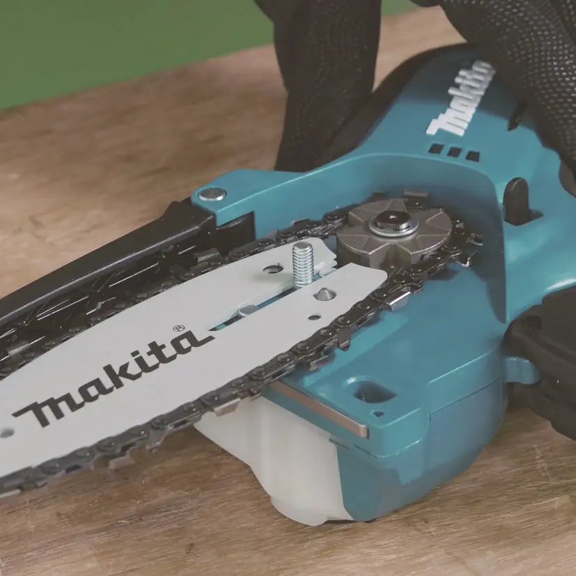 Makita Attrezzature da giardino - 12V AKU sega per potatura 10 cm, 1x batteria Li-ion CXT 2,0 Ah, caricabatterie UC100DWA01